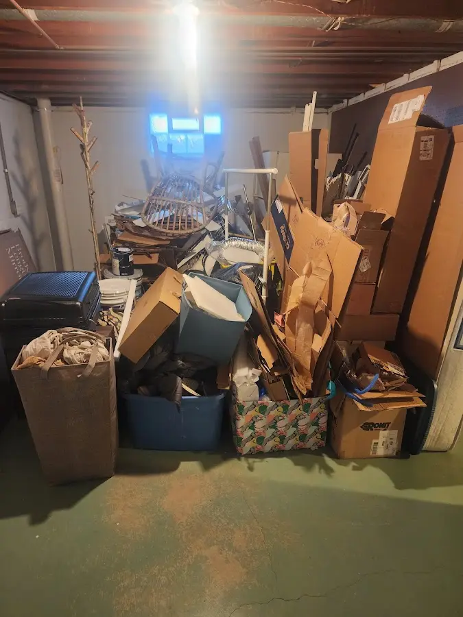 Roll-off dumpster container at job site for 4 Yard Dumpster Rental in Rockland